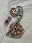 Garbaruk Rear Derailleur Cage + Pulleys Kit Sram Force Axs 12-SPEED, Slv/org. Fixed Price $135.00.
