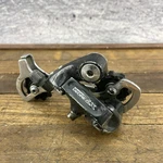 Vintage Shimano Deore Lx RD-M563 Rear Derailleur Long Cage Integrated Sis A7. Fixed Price $26.17.