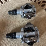 Shimano PD-M520 Double-sided Spd Clipless Bike Pedals. Fixed Price $28.00.