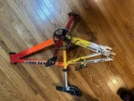 Redline Bicycle Frame Orange Yellow White Crankset Pedals Seatpost Saddle. Fixed Price $200.00.