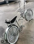 20" Lowrider Chrome Bike, W/ Black Velour Seat, 144 Spokes Wheel, Twisted Parts. Fixed Price $1959.99.
