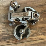 Shimano RD-A105 Golden Arrow Arabesque Rear Derailleur 6-7 Speed Short Cage. Fixed Price $64.99.