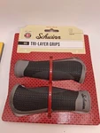 Schwinn Ergonomic Tri Layer Gel Comfort Black Gray Bike Grips SW75823-6. Fixed Price $18.00.