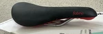 Fabric Scoop Race Radius Bicycle Saddle 142MM Black Red 270 Grams Mountain Bike. Fixed Price $55.00.
